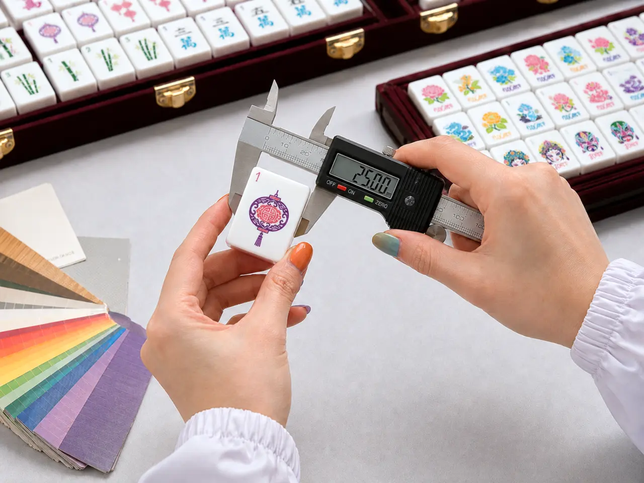 Quality inspector measuring the width of a custom American Mahjong tile
